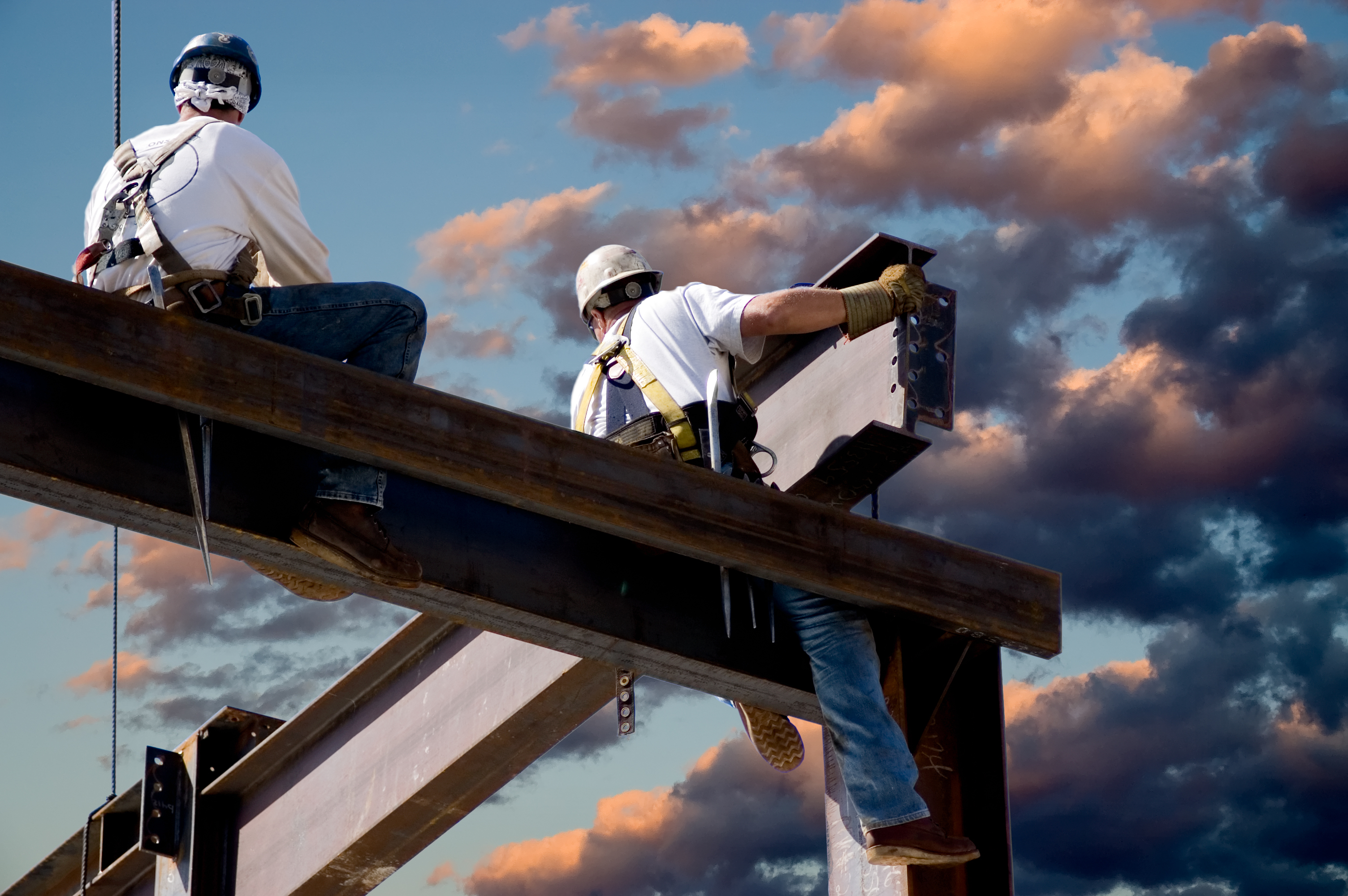 construction-workers-on-beam - Matthiesen, Wickert & Lehrer S.C.